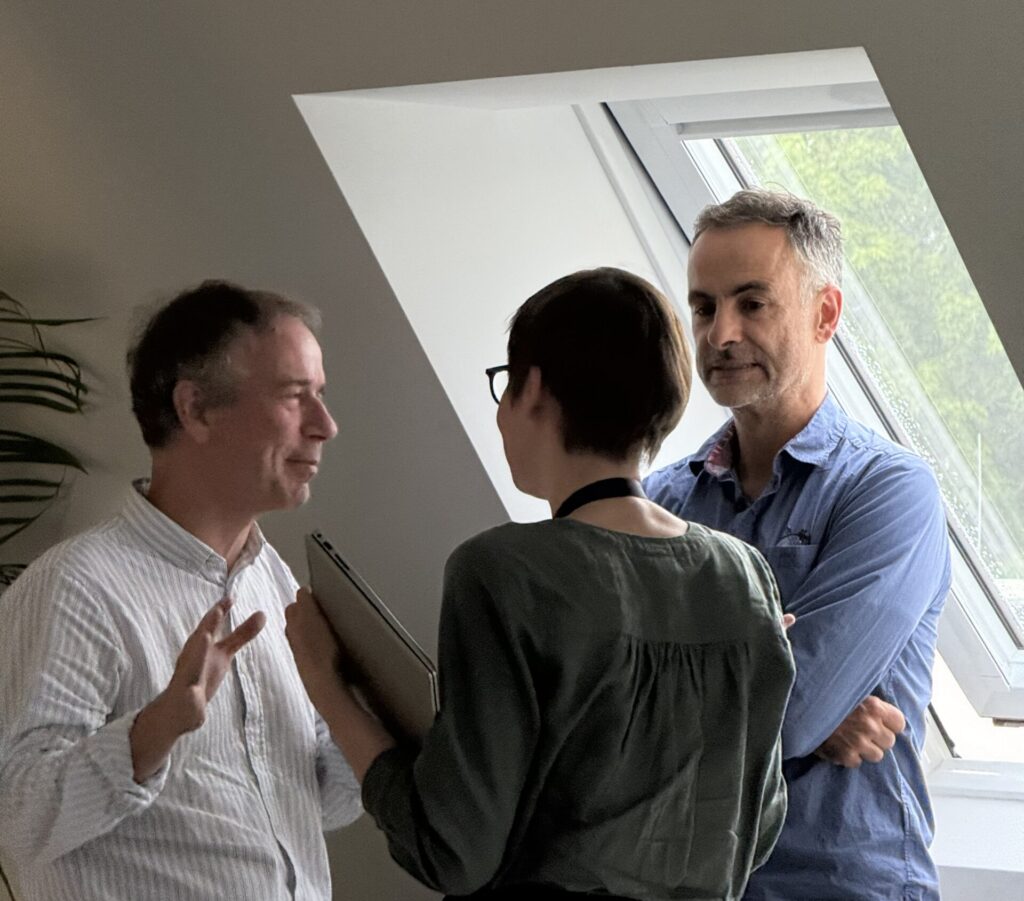 Prof. Pils, Prof. Krajewski and Prof Ferraz conversating