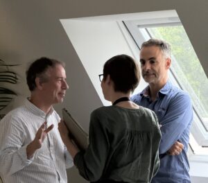 Prof. Pils, Prof. Krajewski and Prof. Ferraz conversating